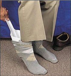 Dressing Aids Foot Socker provides assistance when donning your socks * A scoop shaped trough holds the sock open while you slip your foot into them * The rigid handle provides firm control as you slide your foot far enough into the sock so that you can use your hands to finish the application *