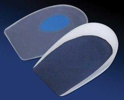 Heel Cups COVERED * Small, 1 Pair * Dual durometer for medial-side or spur/fascia relief and maximum comfort while standing, walking or running * Medium-durometer silicone in main body efficiently absorbs impact and recovers quickly * Softer silicone 