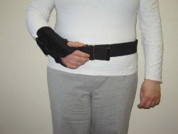 Arm Slings RIGHT * Large * Designed for people with hemiplegia to use instead of a regular arm sling * Protects and supports the hemiplegic arm during all aspects of functional mobility * 2 piece design; consists of a wrist support and a heavy duty cotton belt * Wrist support attaches to belt with hook-and-loop and detaches when not needed * Easy to put on and take off *