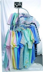Reusable Patient Exam Gowns Waterfall spiral gown rack holds 29 patient gowns * Hangers and gowns not included * This item is free from Salk if it is ordered in conjunction with 24 gowns